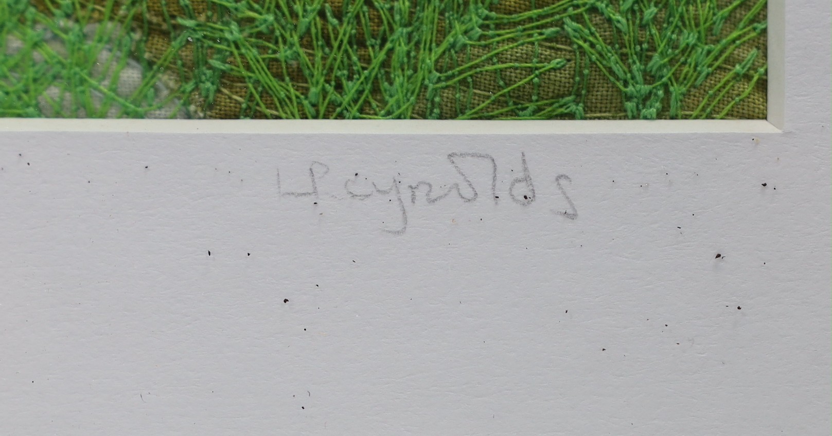 Textile landscape design by L Reynolds. Signed outside the plate. 14 x 29cm